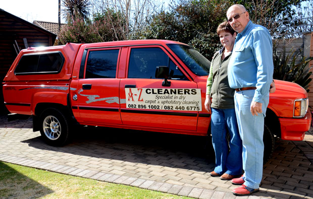 Johan and Esther Botes in front of their iconic red Hilux